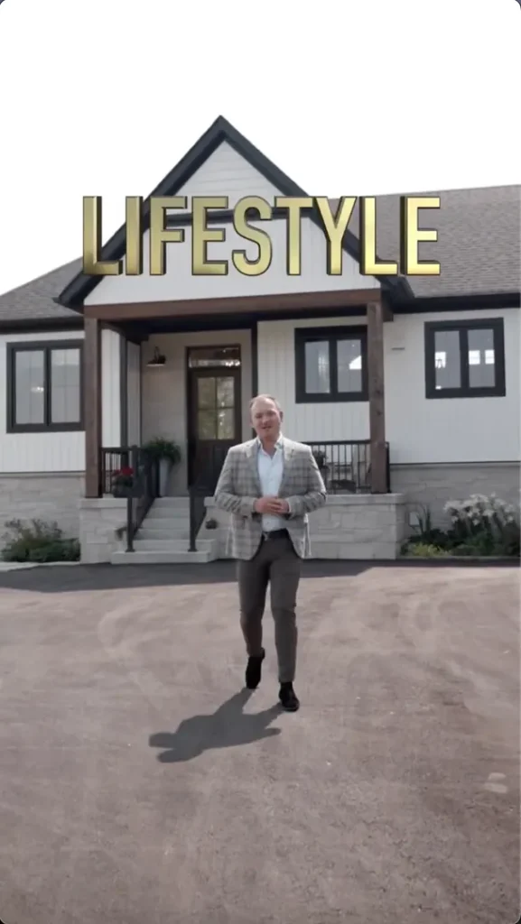 A man in a suit walks toward the camera in front of a modern house with "LIFESTYLE" written above the roof in large gold letters.